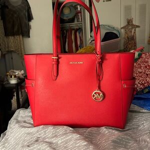 NWT Michael Kors, large red Italian leather travel tote.